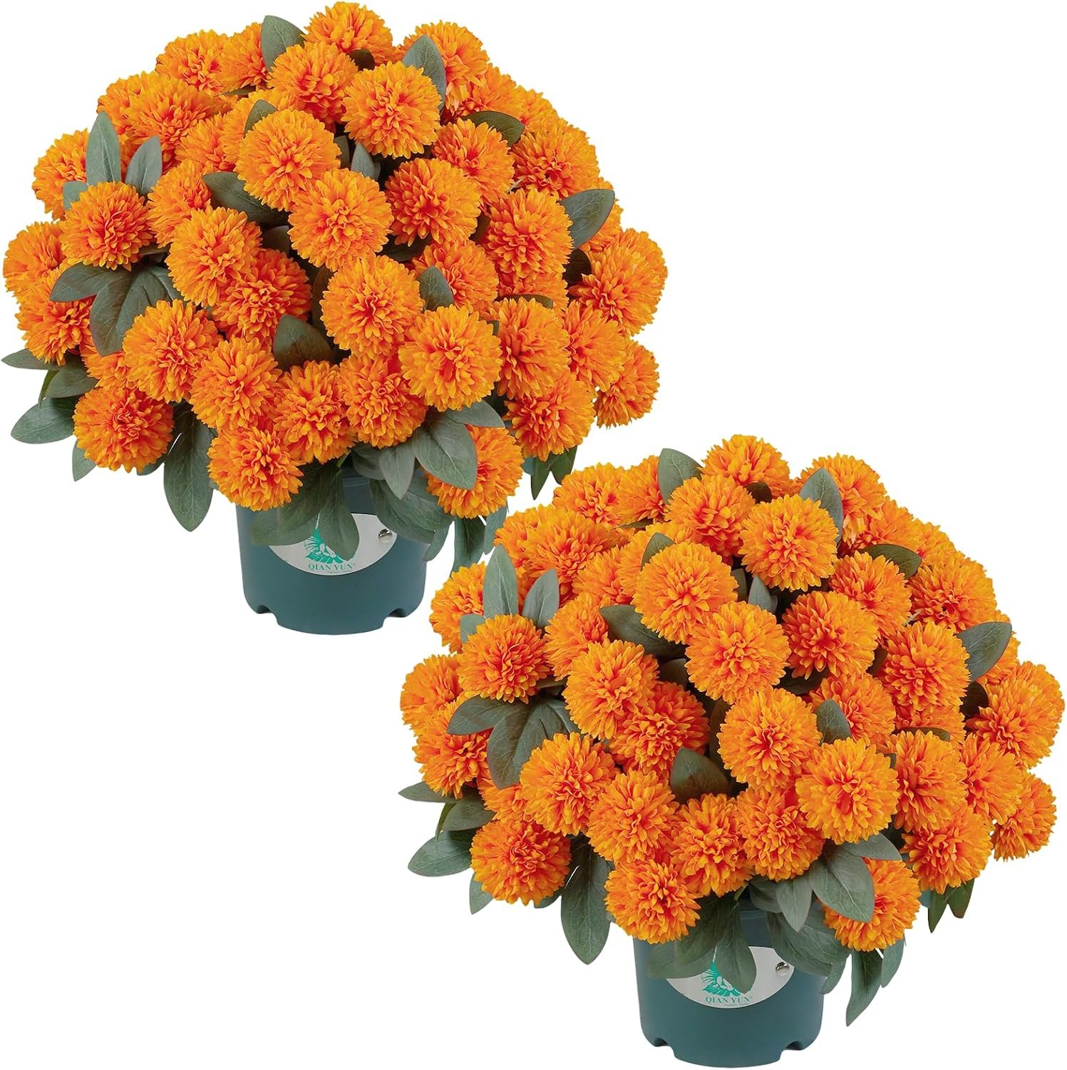 Orange potted mums displayed on a front porch railing as part of autumn entryway decor